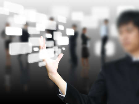 Businessman holding touchscreen 