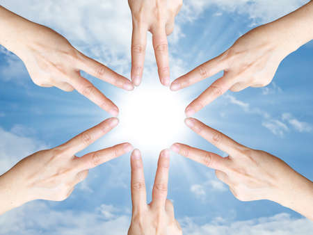 Hand make frame around the sunの写真素材