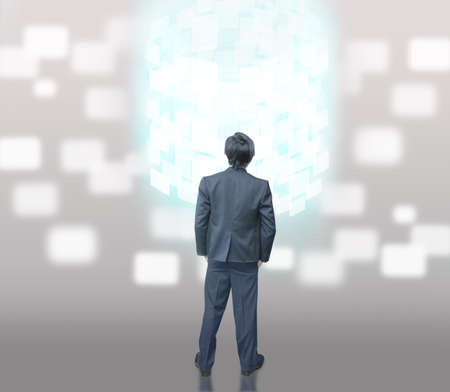 Businessman look virtual monitorの写真素材