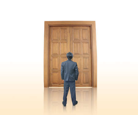 Businessman with door