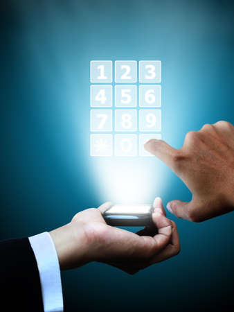 Business hand press mobile phoneの写真素材