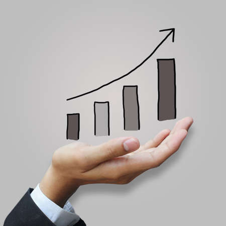 Growing graph in handの写真素材