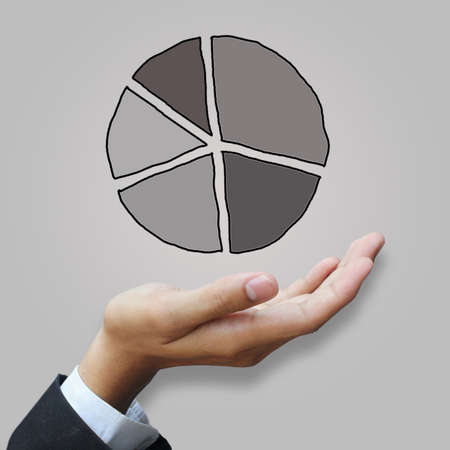 Business hand holding chartの写真素材