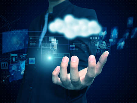 businessman holding technologyの写真素材