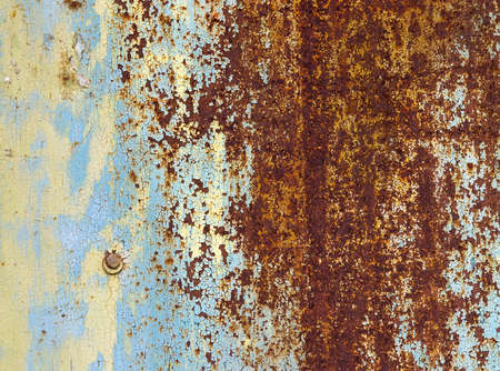 old rusty iron wall of different color