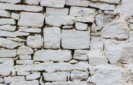 old wall from large gray cobble-stonesの写真素材
