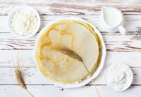 pancakes on a white wooden backgroundの写真素材