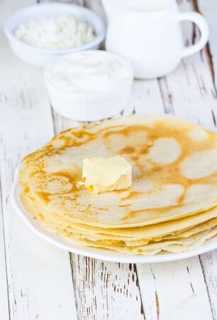 pancakes on a white wooden backgroundの写真素材