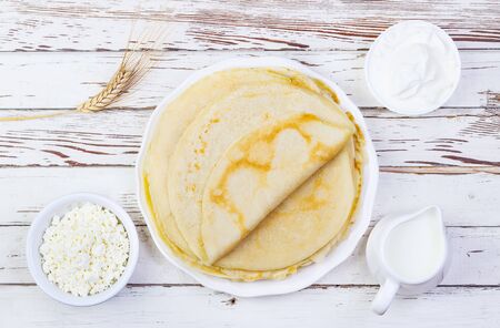 pancakes on a white wooden backgroundの写真素材