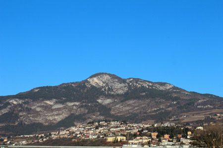 Beautiful city view, mountains and blue sky in Trento, Italy. Popular touristic european destination. Northern Italyのeditorial素材