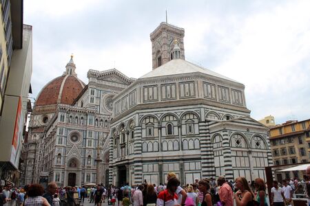 July 24, 2016, Florence, Tuscany, Italy. Florence street with people and view of Santa Maria del Fiore Cathedral(Florence Duomo). Popular touristic european destination. Florence city viewのeditorial素材