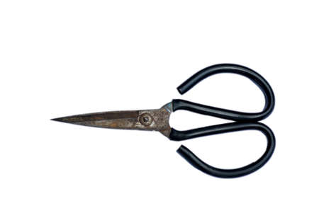 Old rusty scissors (isolated on white background)の写真素材