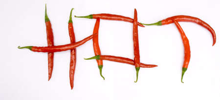Fresh Ripe Cayenne Peppers on Whiteの写真素材