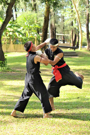 Trick of ancient fighter in Asian war with empty hands.のeditorial素材