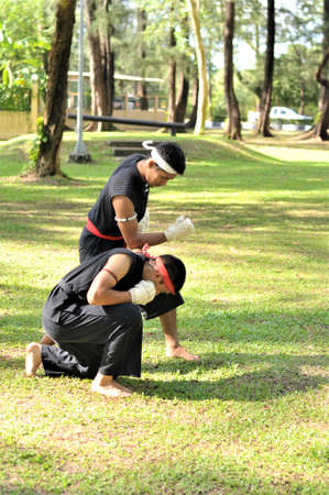 Trick of ancient fighter in Asian war with empty hands.のeditorial素材