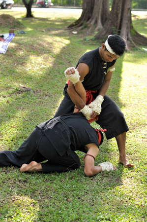 Trick of ancient fighter in Asian war with empty hands.のeditorial素材