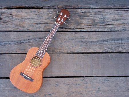 ukulele on old woodenの写真素材