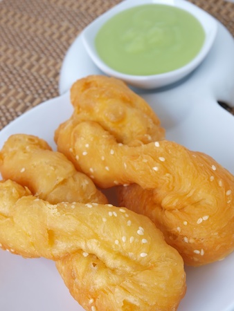 deep fried doughstick with egg custard の写真素材