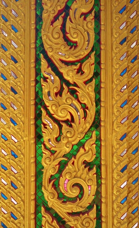 golden thai style pattern in temple の写真素材