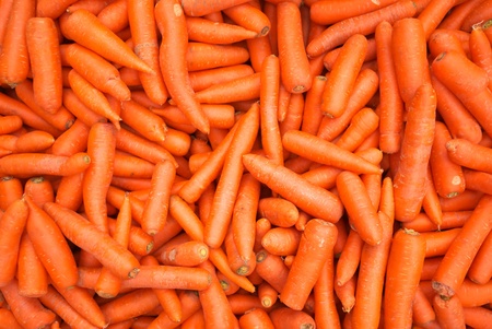 heap of carrot in market の写真素材
