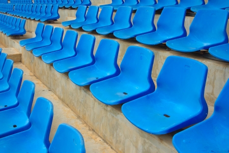 empty blue seats in a stadium の写真素材