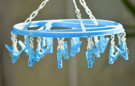Clothes hanger clamp