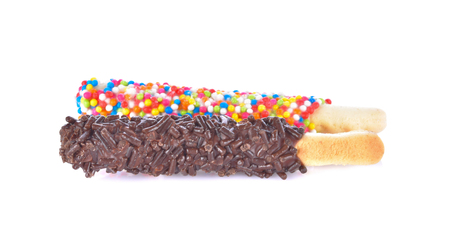 bread sticks isolated coated with chocolatd on white backgroundの写真素材