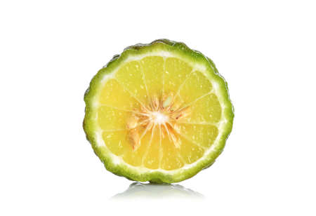 Piece Kaffir lime on white backgroundの写真素材
