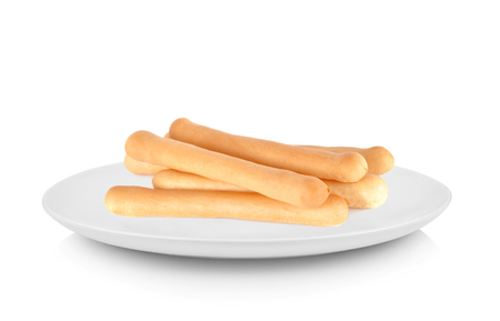 bread sticks isolated in white plate on white backgroundの写真素材