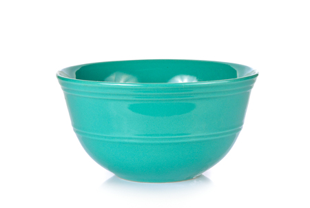 Green bowl on white backgroundの写真素材
