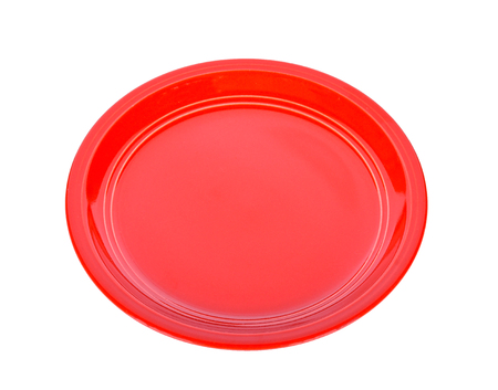 Red plate on white backgroundの写真素材