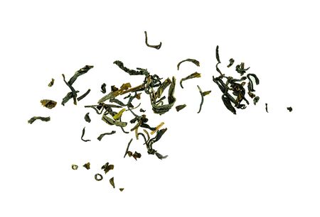 Dry green tea leaves on white backgroundの写真素材