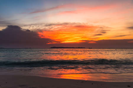 Colorful sky at sunset time on the beach.の写真素材