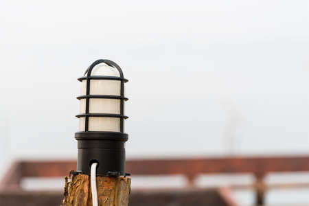 Street lantern on wooden pole.の写真素材