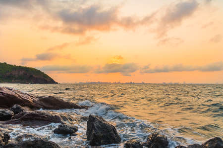 Sunrise on a rocky coast.の写真素材