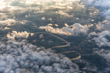 Over clouds and river with sunlight.の写真素材