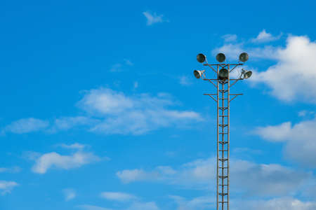 Spot light for stadium with blue sky background