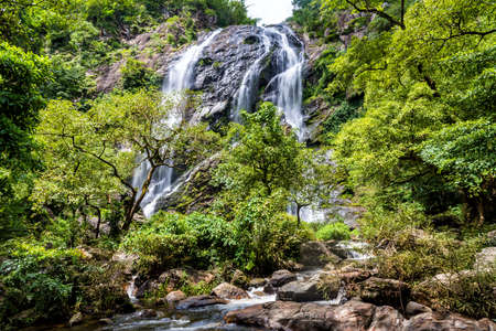 Beautiful waterfall in rain forest, Klong Lan National Park in Kampangpetch, Thailandの写真素材