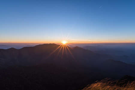 Sky and mountains after sunrise in Kanchanaburi, Thailand.の写真素材