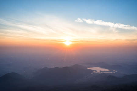 Great sunrise above the mountain valley and morning mist.の写真素材