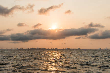 Sunrise above Pattaya city on morning , view from KhoLan Island.の写真素材