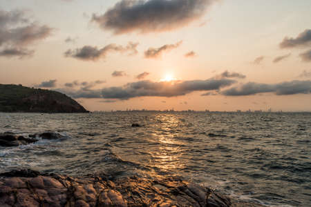 Sunrise above Pattaya city on morning , view from KhoLan Island.の写真素材