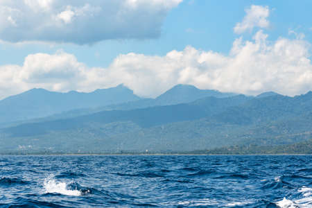 Blue sea at cloudy day in Lombok Island, Indonesia.の写真素材