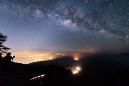 Milky way and Zodiac light on night sky above Doi Inthanon National park. Chiang mai, Thailand.の写真素材