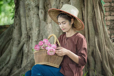 Beautiful Asian Woman dressed in traditional costume of Thailandの写真素材