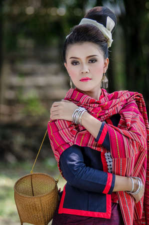 Beautiful Thai girl in Thai dress identity  traditional costume, culture of Thailandの写真素材