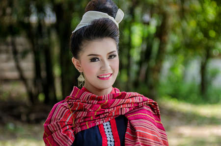 Beautiful Thai girl in Thai dress identity  traditional costume, culture of Thailandの写真素材