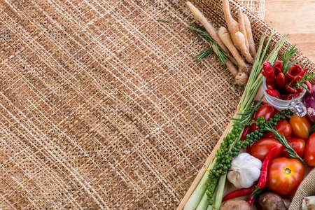Healthy eating background / studio photography of different fruits and vegetables on wooden table - Thai Herbの写真素材