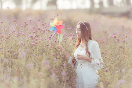 Beautiful bride wedding bouquet outdoors in a forest.