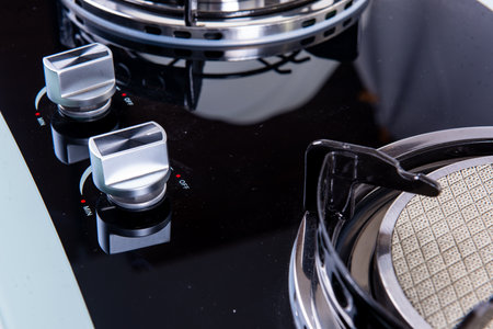 Closeup shot  domestic kitchen gas stove
.  kitchen interior and Luxury apartment for sale. Cozy place for cooking concept. on isolated backgroundの写真素材